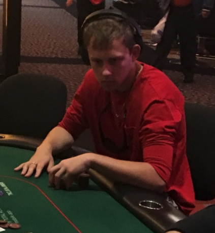 Kyle Fischl sitting at a poker table